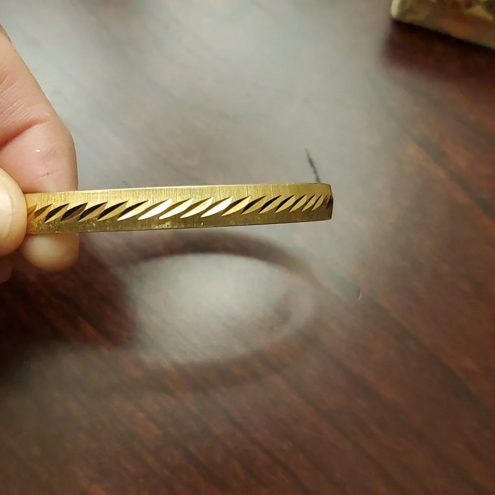 MONET Gold Tone Etched Bangle Bracelet